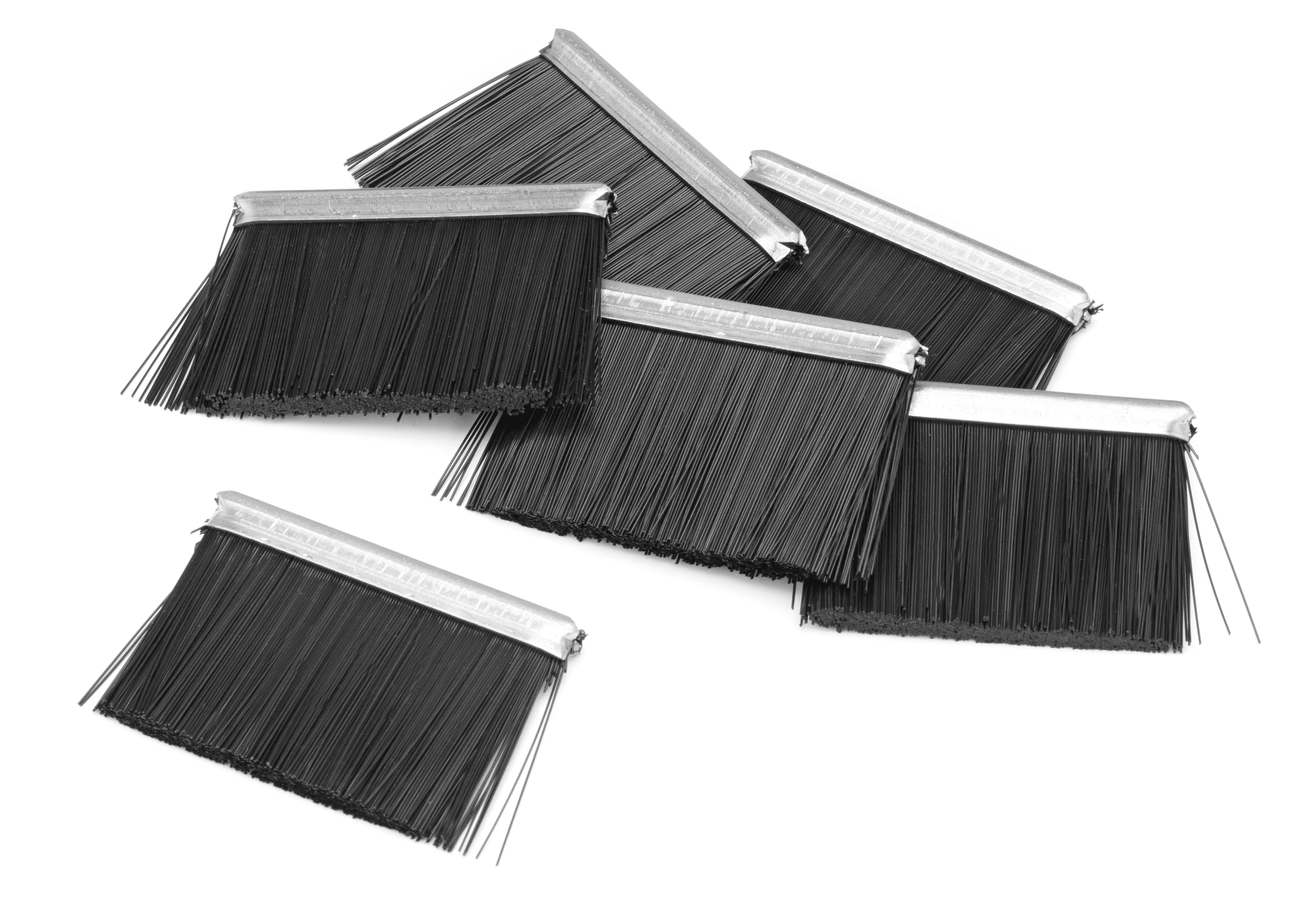 Durable interchangeable poly fiber wheel brushes. Keeps the driving wheels clean from clippings and leaves to maintain improved traction. image